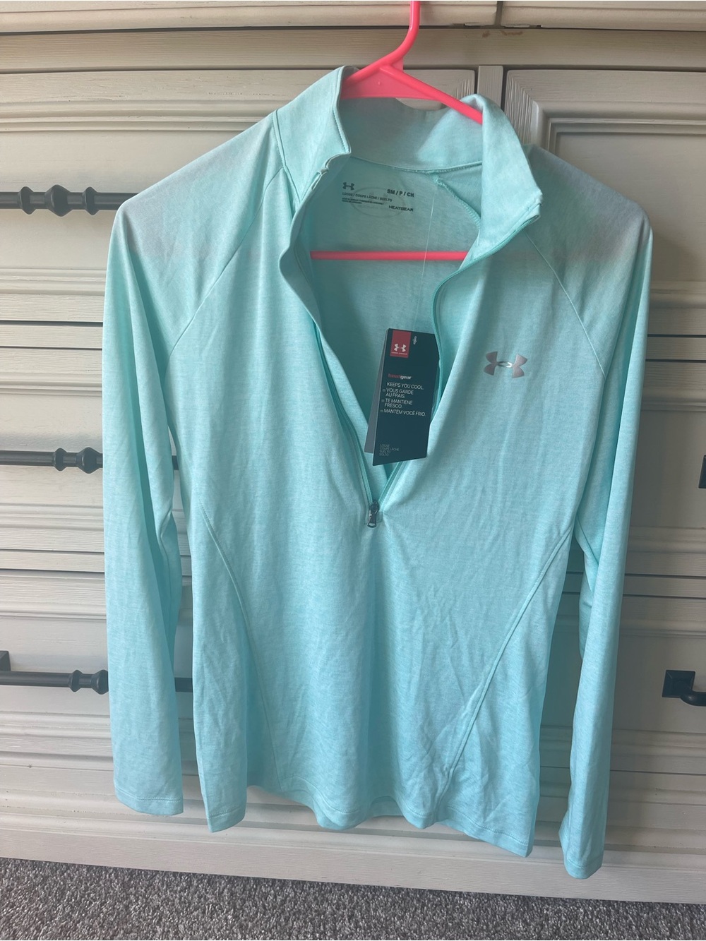 Under Armour Women’s Light Aqua 1/4 Zip sweatshirt